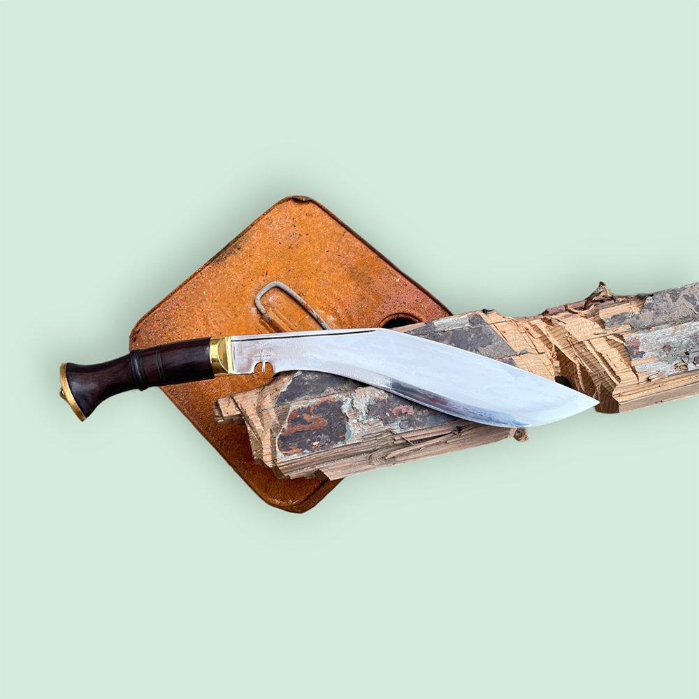 10.5 inch high carbon steel kukri with a wooden handle chopping a wood