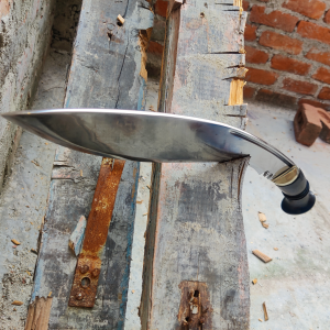 Fort William MK1 Kukri chopping wood with an Indian rosewood handle