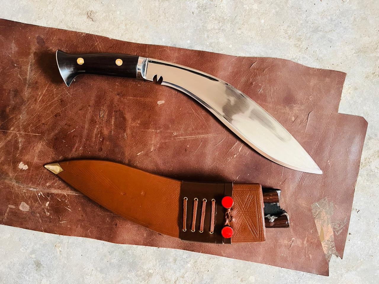 M43 kurki placed with leather sheath, military kukri knife