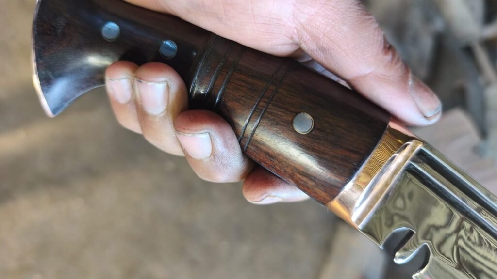 Full flat tang Khukuri handle, hande made in Nepal, showing how full tang kukris are made.